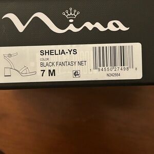 Nina black shimmering beautiful sandals. Wore to wedding one time.